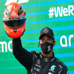 lewis hamilton waves to fans after winning the Eifel Grand Prix in Nurburg, Germany